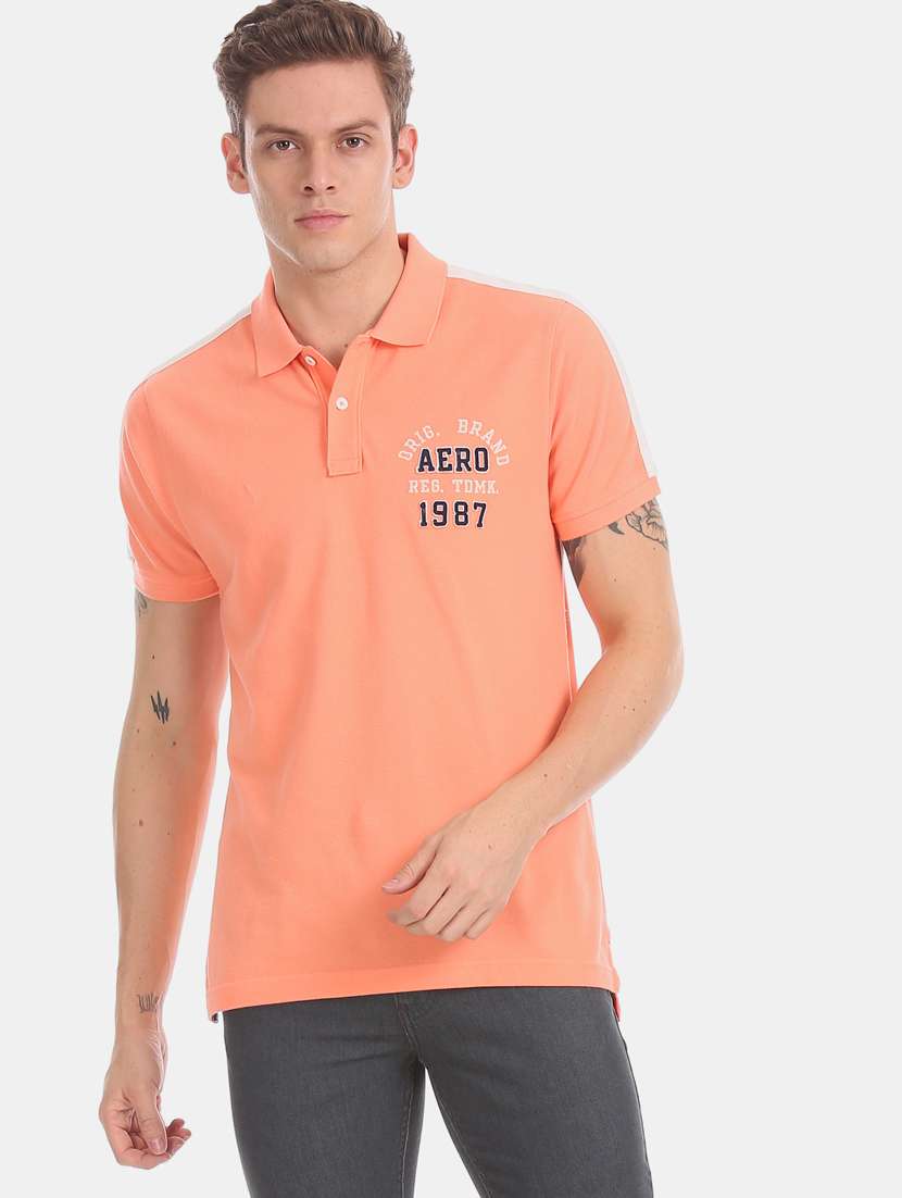 orange self design polo t-shirt 