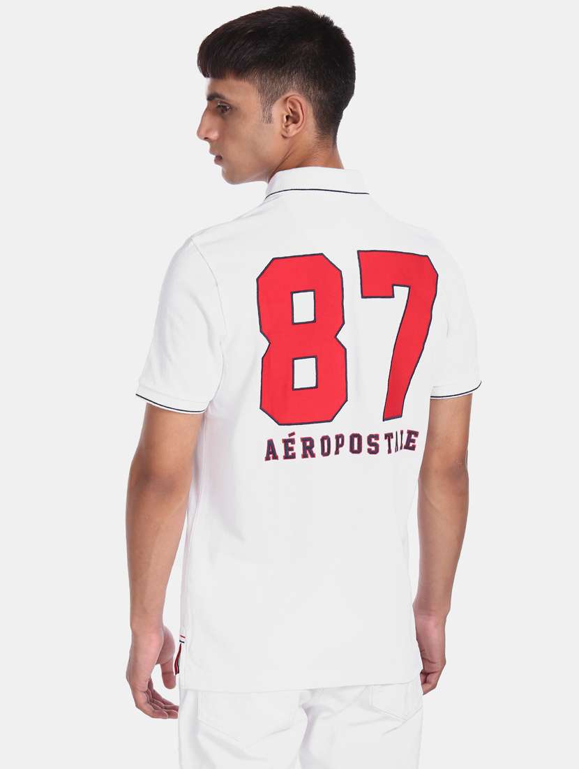 white printed polo t-shirt  - 17625719 -  Standard Image - 1