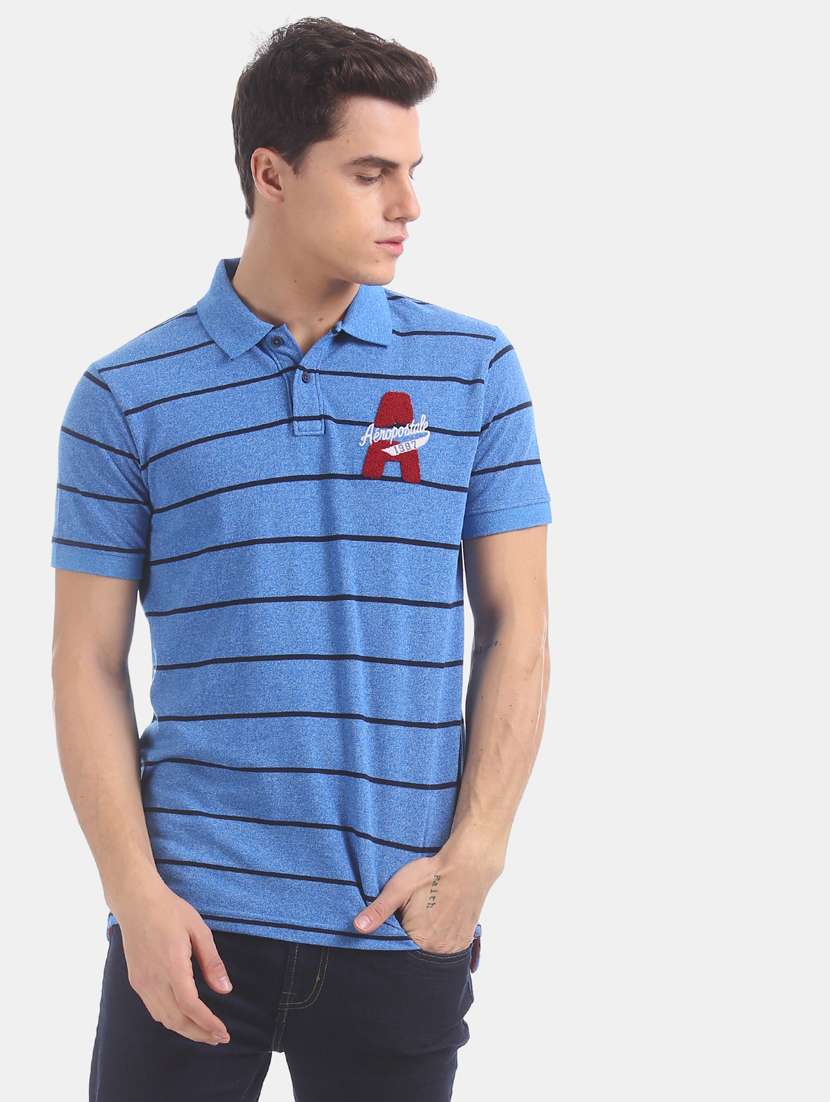 blue striped polo t-shirt  - 17625729 -  Standard Image - 1