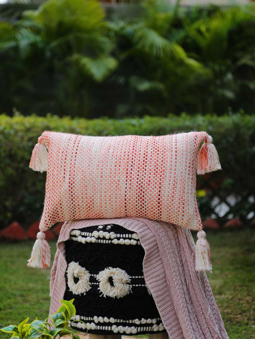 ivory and rust pillow style cushion cover with tassels