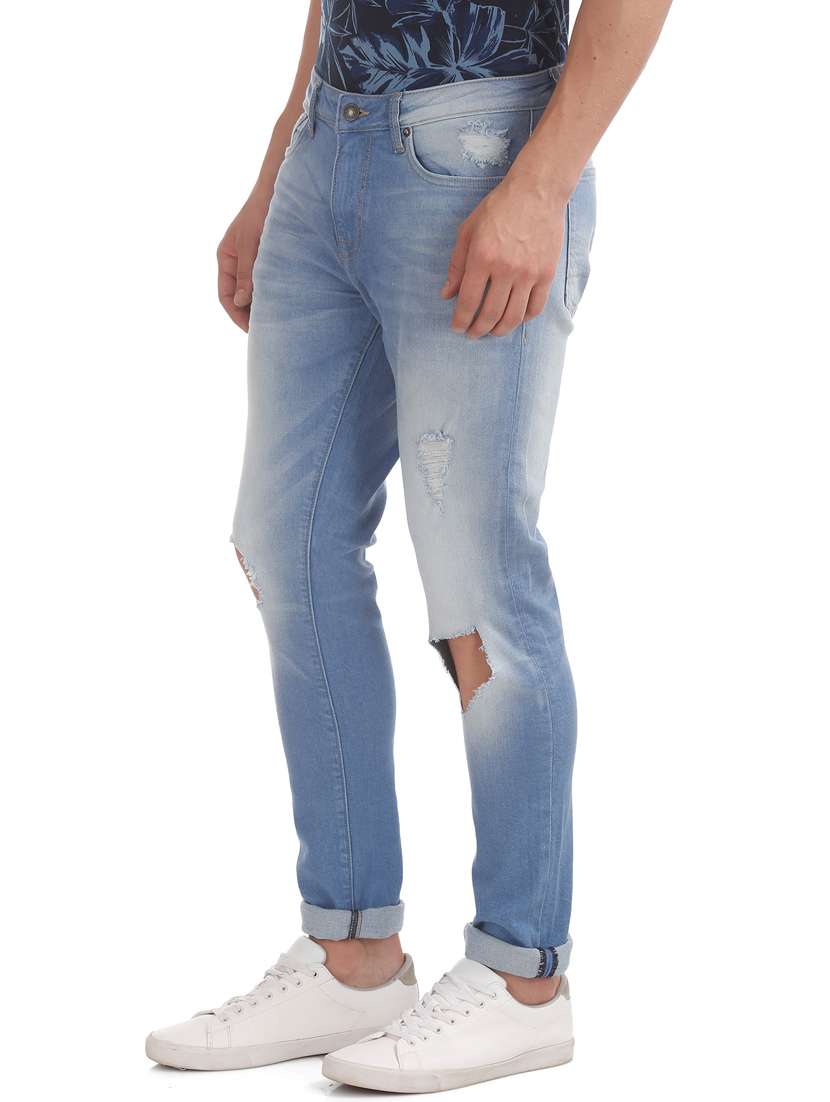 light blue light washed distresses denim jean - 17882924 - Standard Image - 1