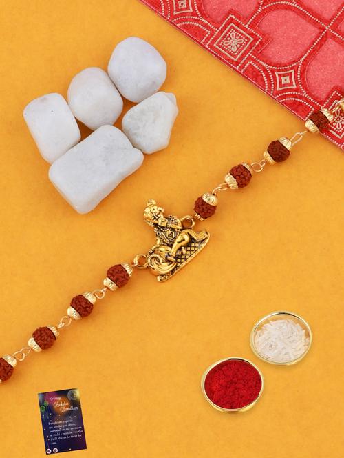 gold plated bracelet rakhi with roli chawal and greeting card  - 17900912 -  Standard Image - 0