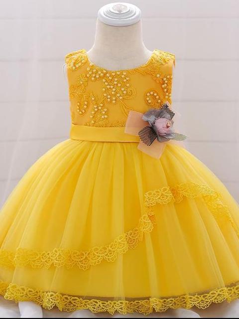 kids beautiful frocks yellow color  - 17967361 -  Standard Image - 1