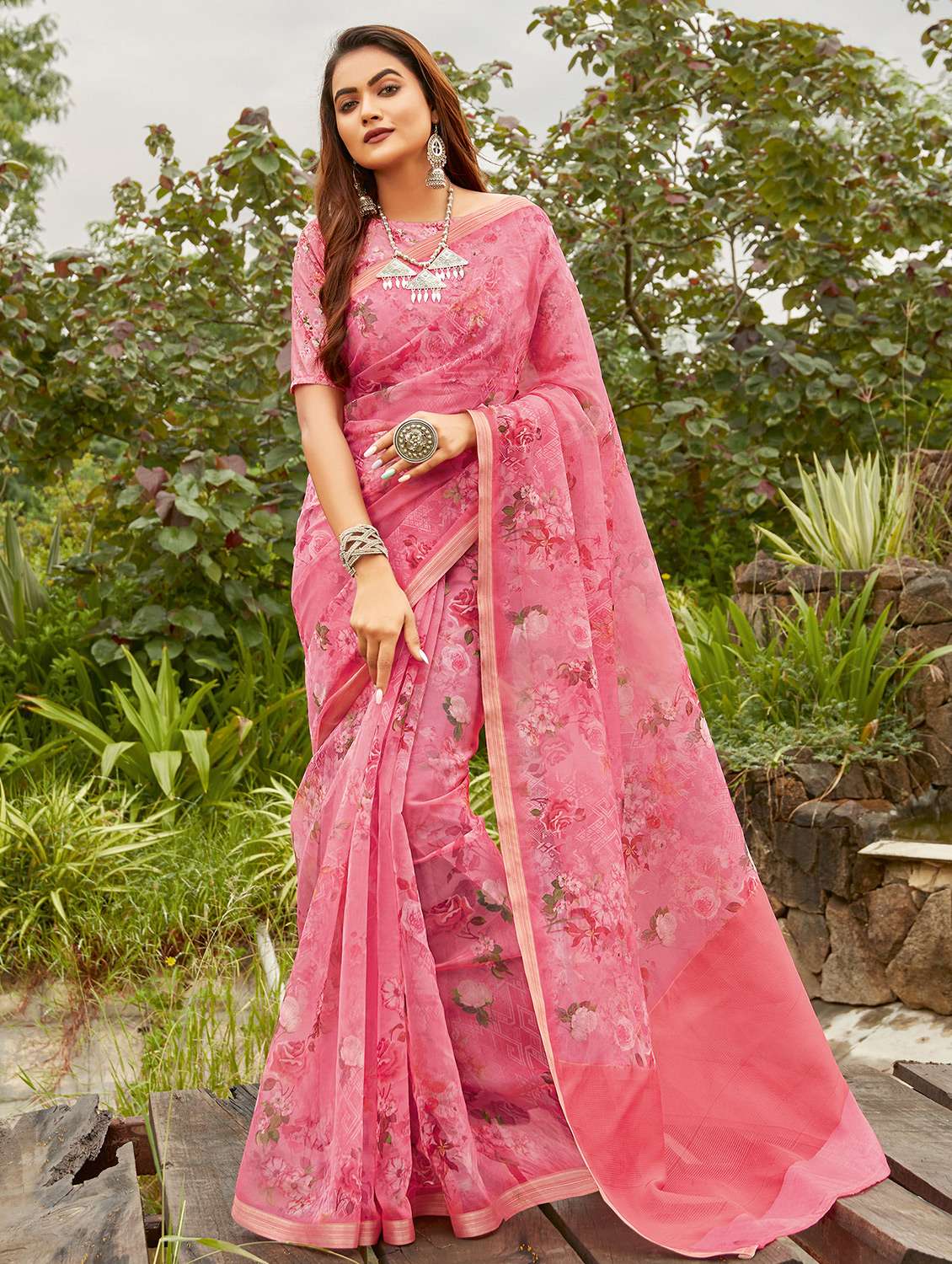 women's floral pink colored saree