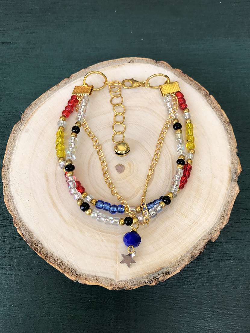 multicolored layered bracelet with blue drop