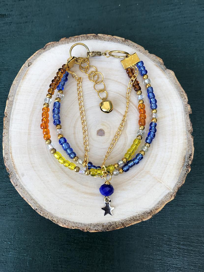 gold tone layered bracelet with blue drop - 18017860 - Zoom Image - 0