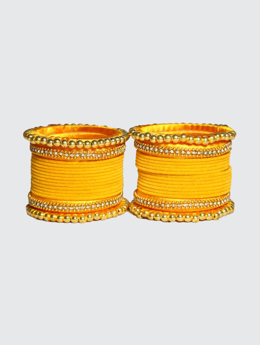 handmade silk thread yellow bangles set of 32 - 18031753 -  Standard Image - 1