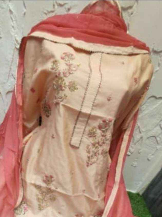 silk suit with thread and hand  - 18119368 -  Standard Image - 1
