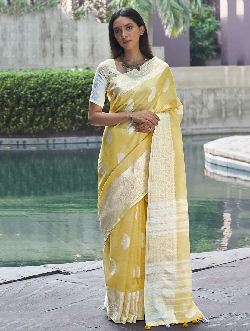 self design zari work woven saree with blouse