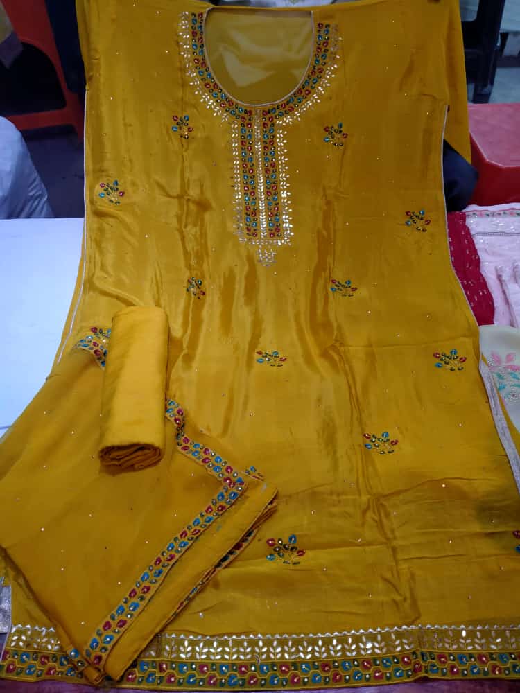 gold chinon suits  - 18158243 -  Standard Image - 1
