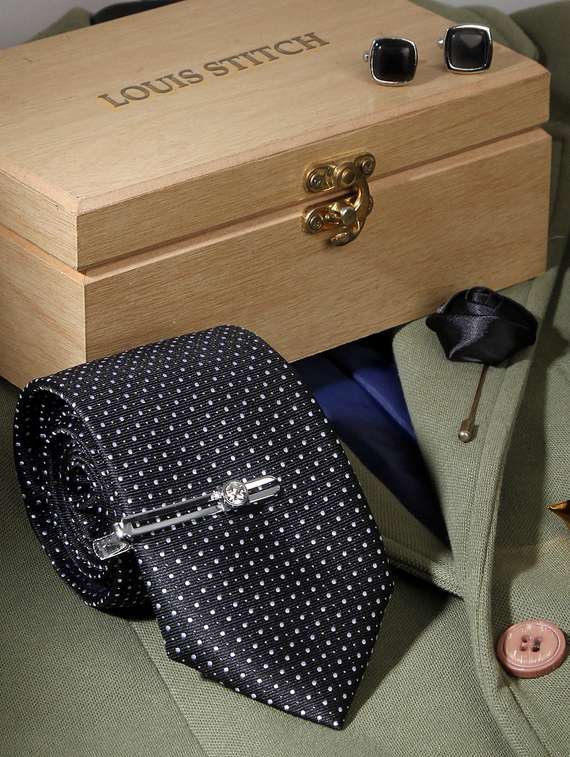 polka black feel silk that is soft, rich in colour and beautiful to feel. the stitching thread are well finished. premium heavy quali interlining gets a perfect knot everytime. loved worldwide for sle ty