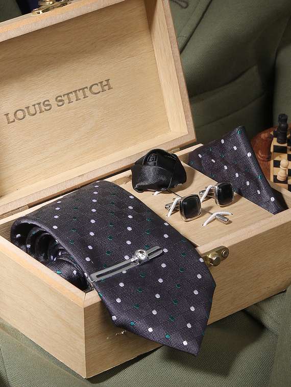 grey polka feel silk that is soft, rich in colour and beautiful to feel. the stitching thread are well finished. premium heavy quali interlining gets a perfect knot everytime. loved worldwide for sle ty