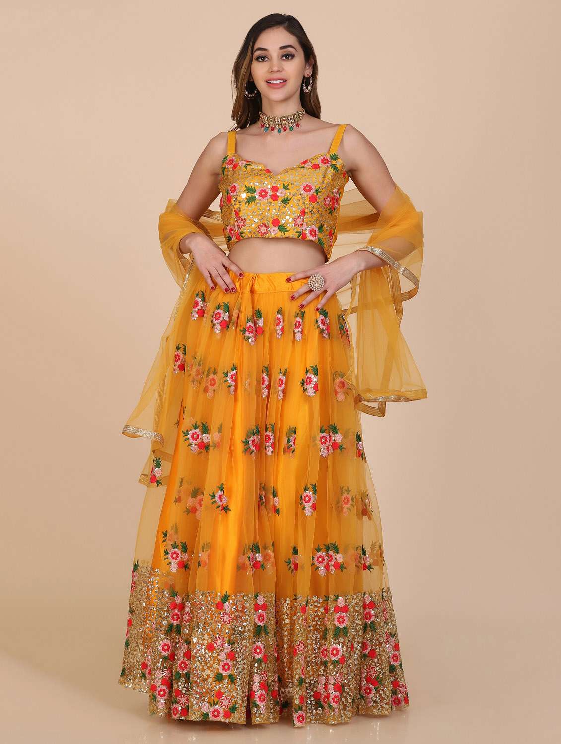 mustard net flared lehenga