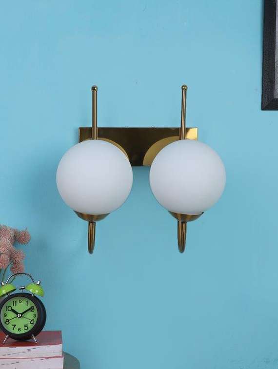 sharp gold iron wall light