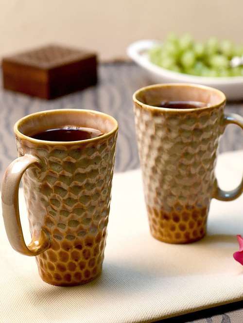 brown ceramic mug