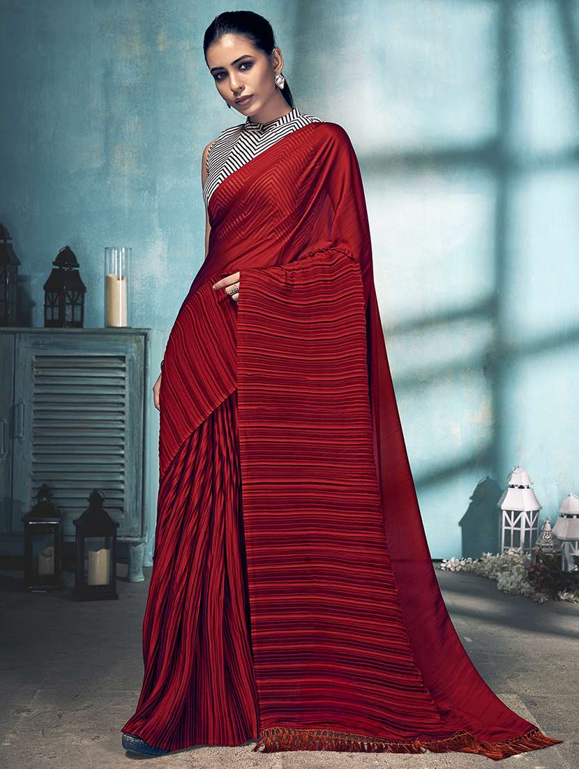 women's solid maroon colored saree with blouse