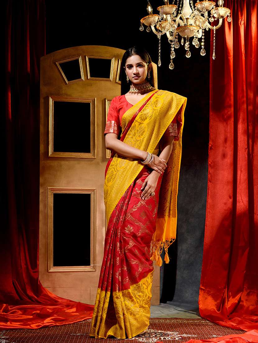 women's self design red colored saree