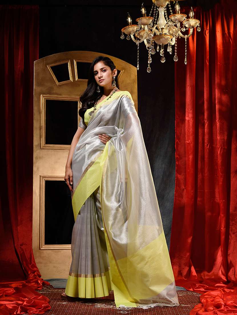 offwhite tissue plain saree with blouse
