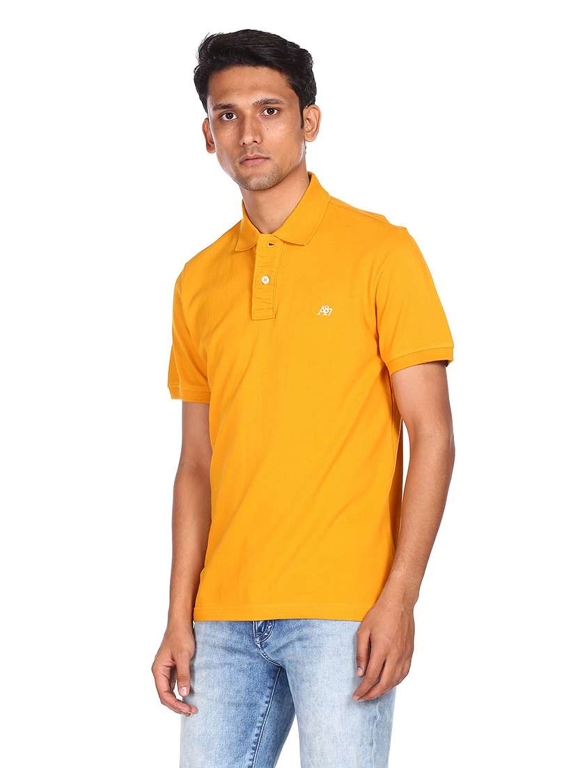 yellow solid polo t-shirt - 18429168 -  Standard Image - 1