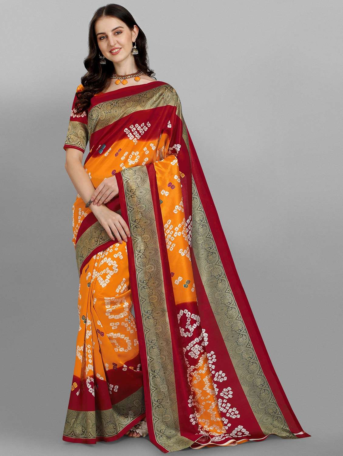 women's bandhani orange colored saree