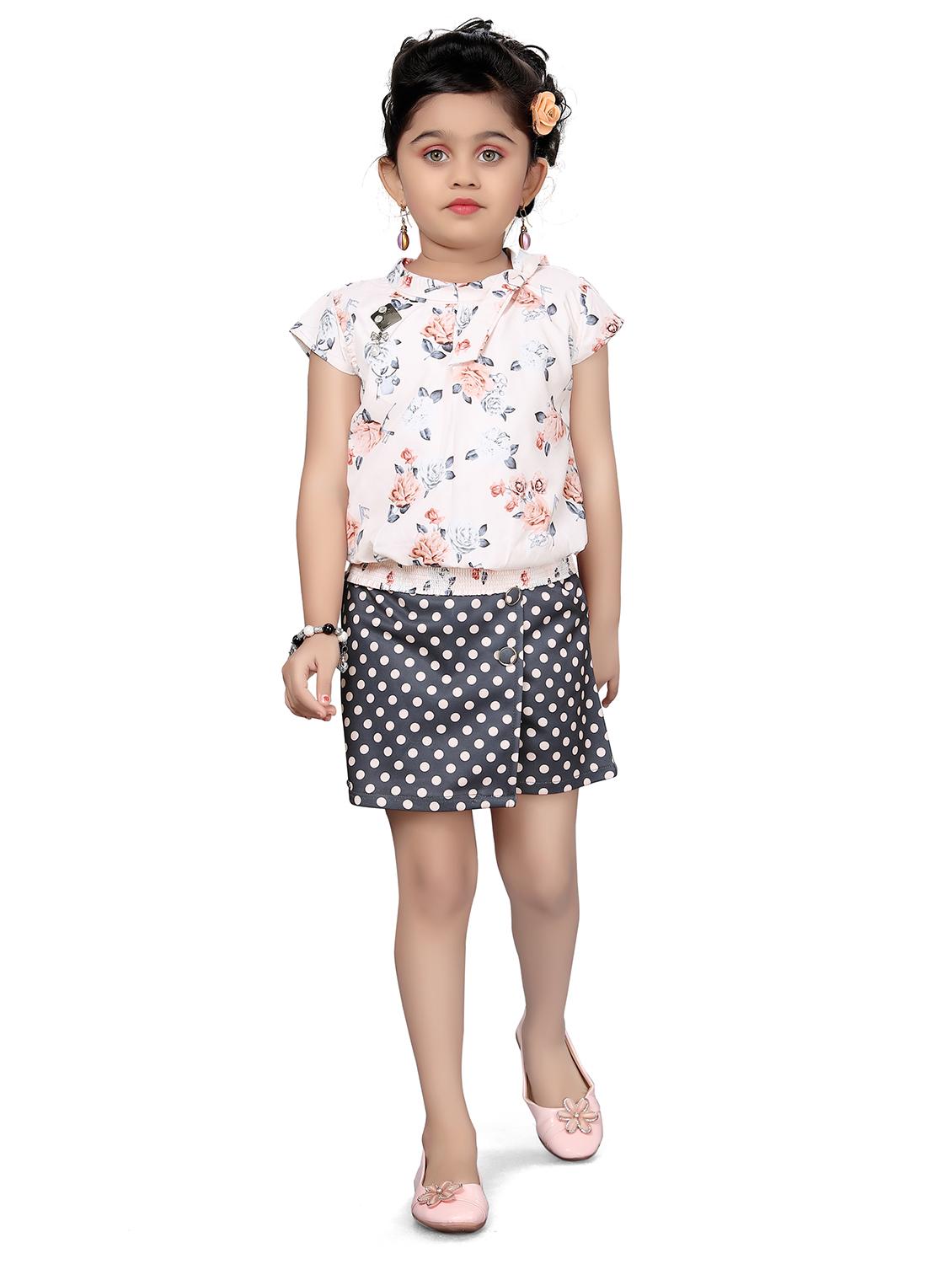 girls white floral top & polka dot skirt  - 18460422 -  Standard Image - 1