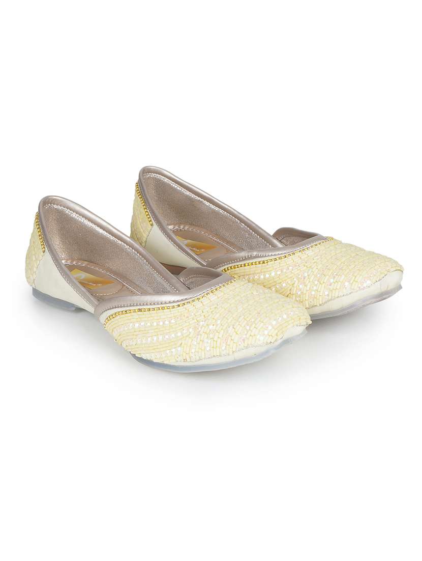 women yellow slip on mojari