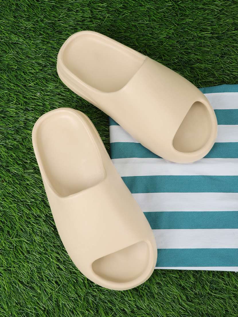 women beige solid slides 