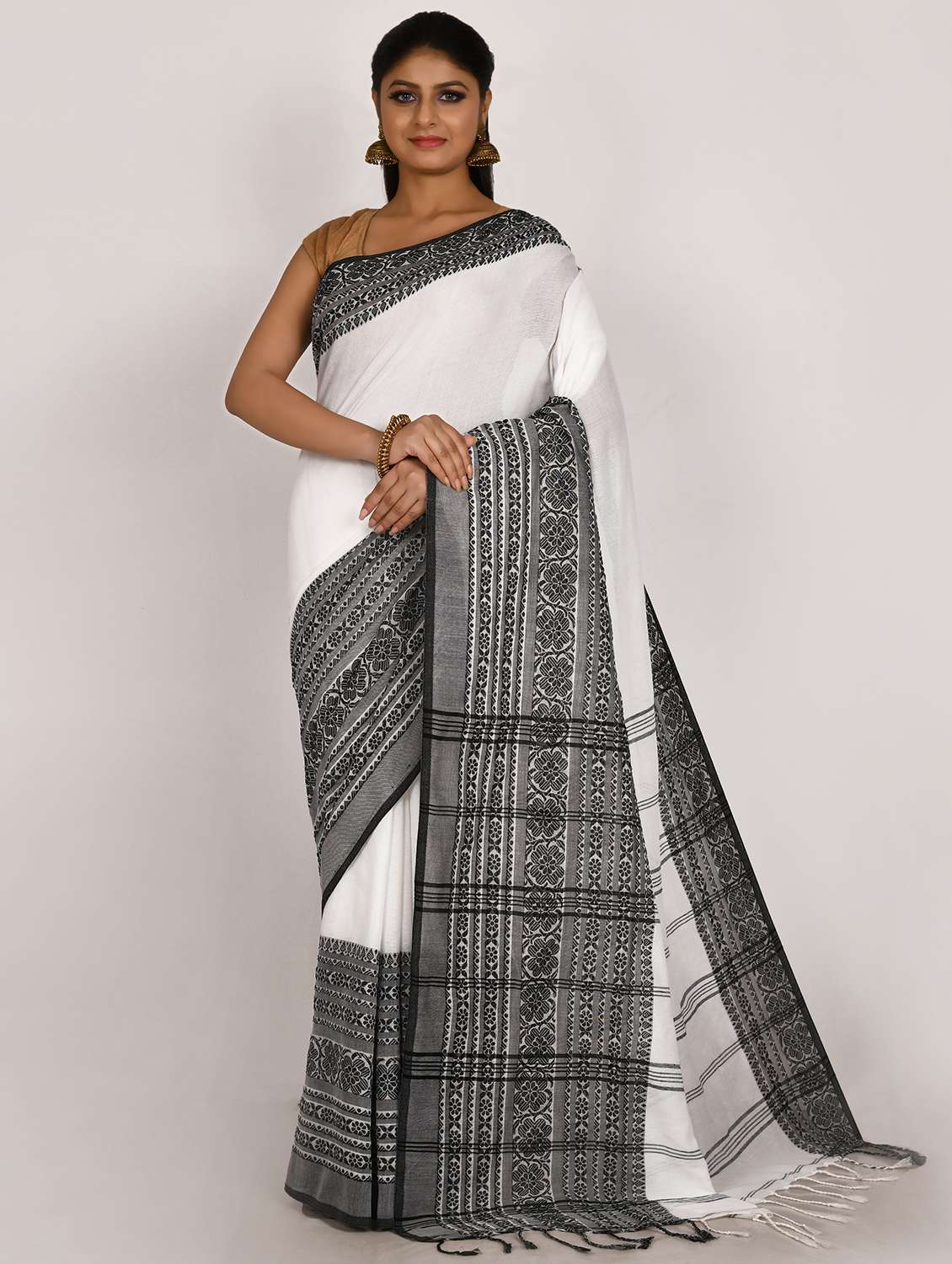 women's self design white colored saree