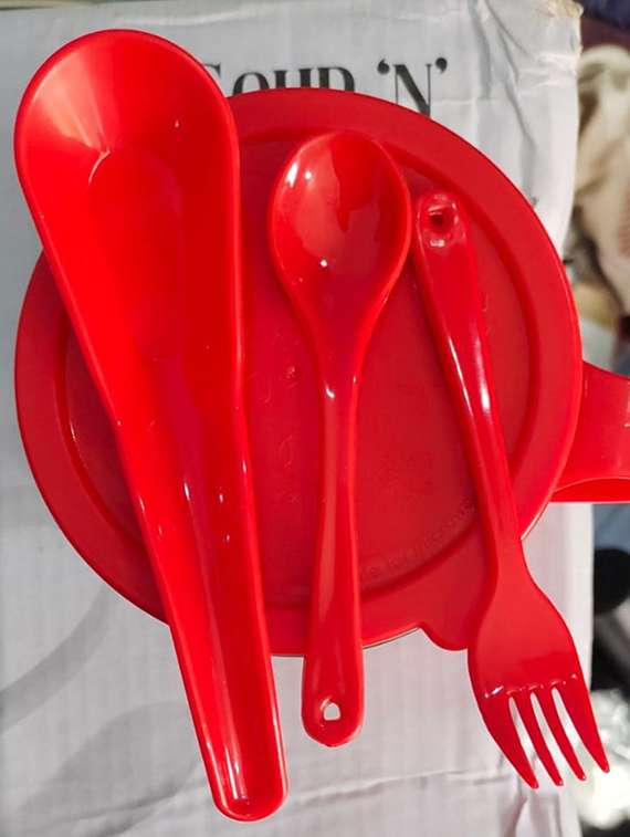 red steel bowl with spoons and fork