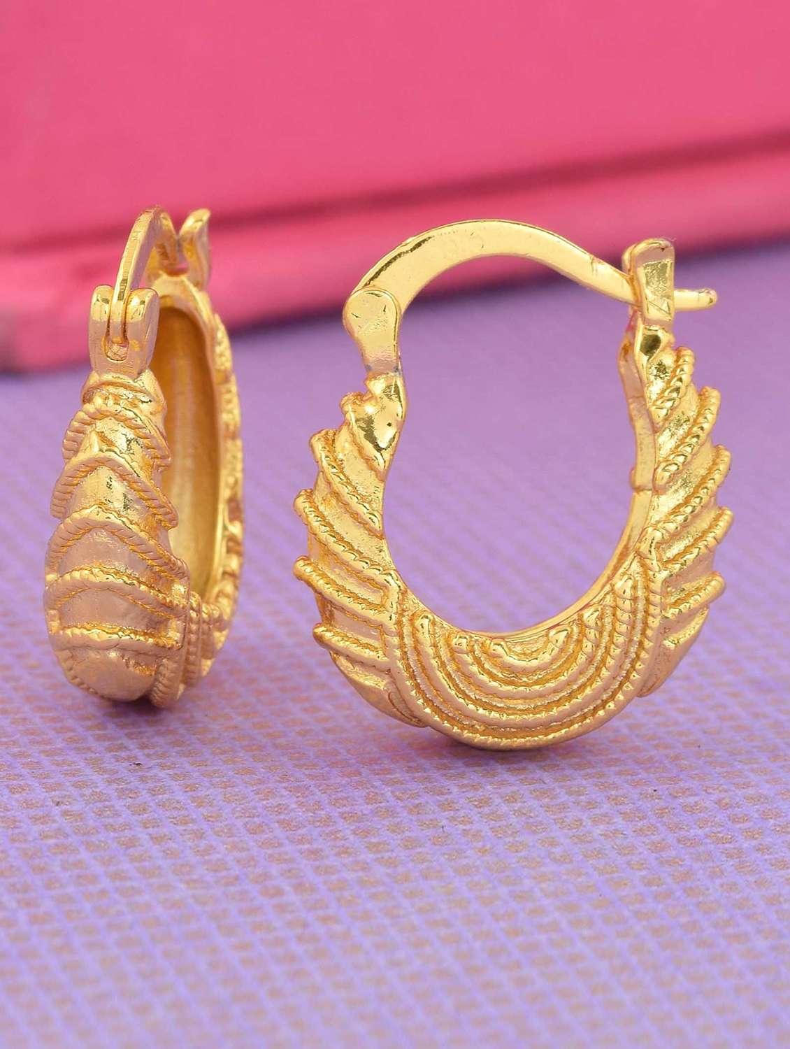 women golden hoop earring