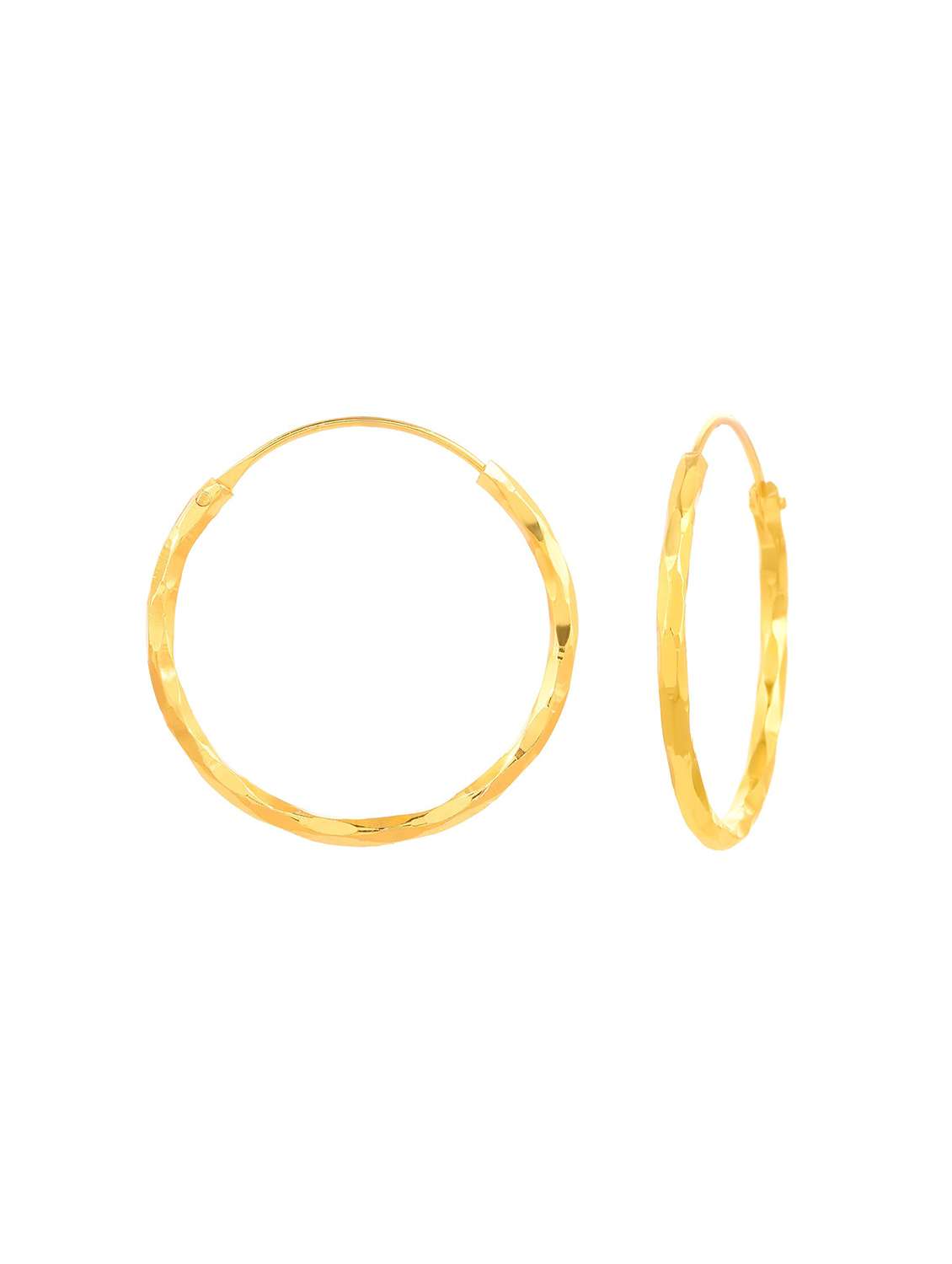 women golden hoop earring - 18534305 -  Standard Image - 1