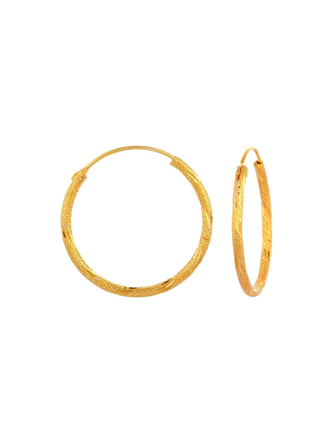women golden hoop earring - 18534340 - Standard Image - 1