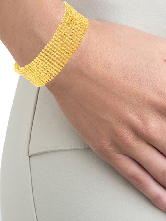 gold brass bangle - 18534715 - Standard Image - 1