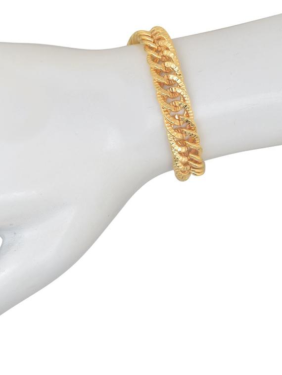 gold brass bangle - 18534805 - Standard Image - 1