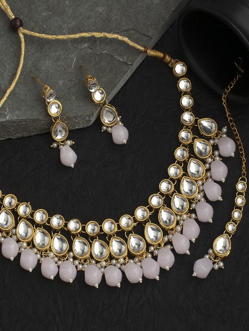 gold plated necklace with earrings  - 18567599 -  Standard Image - 0