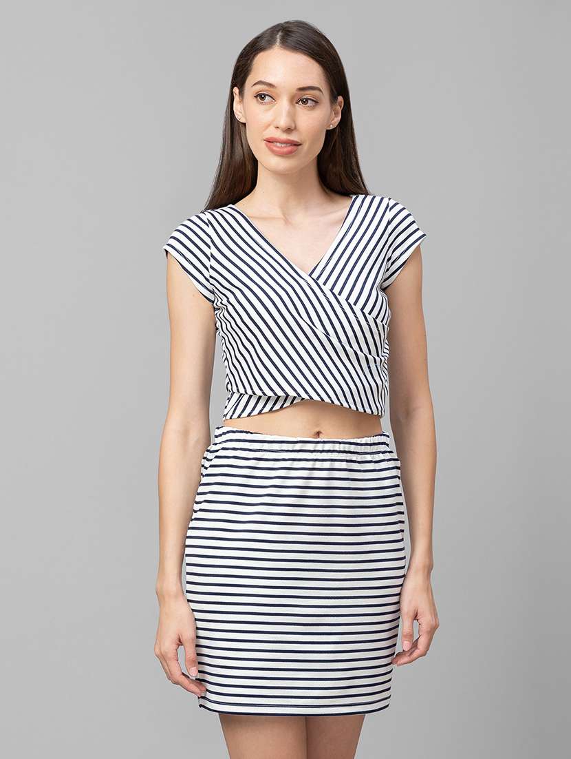 white polyester crop top and skirt set 