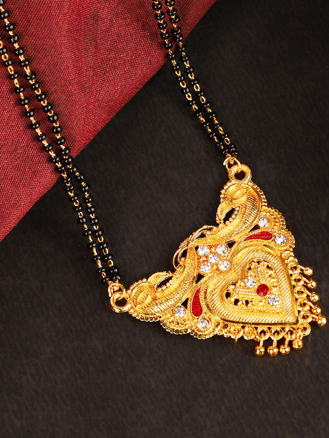 antique gold plated metal mangalsutra - 18616958 -  Standard Image - 1