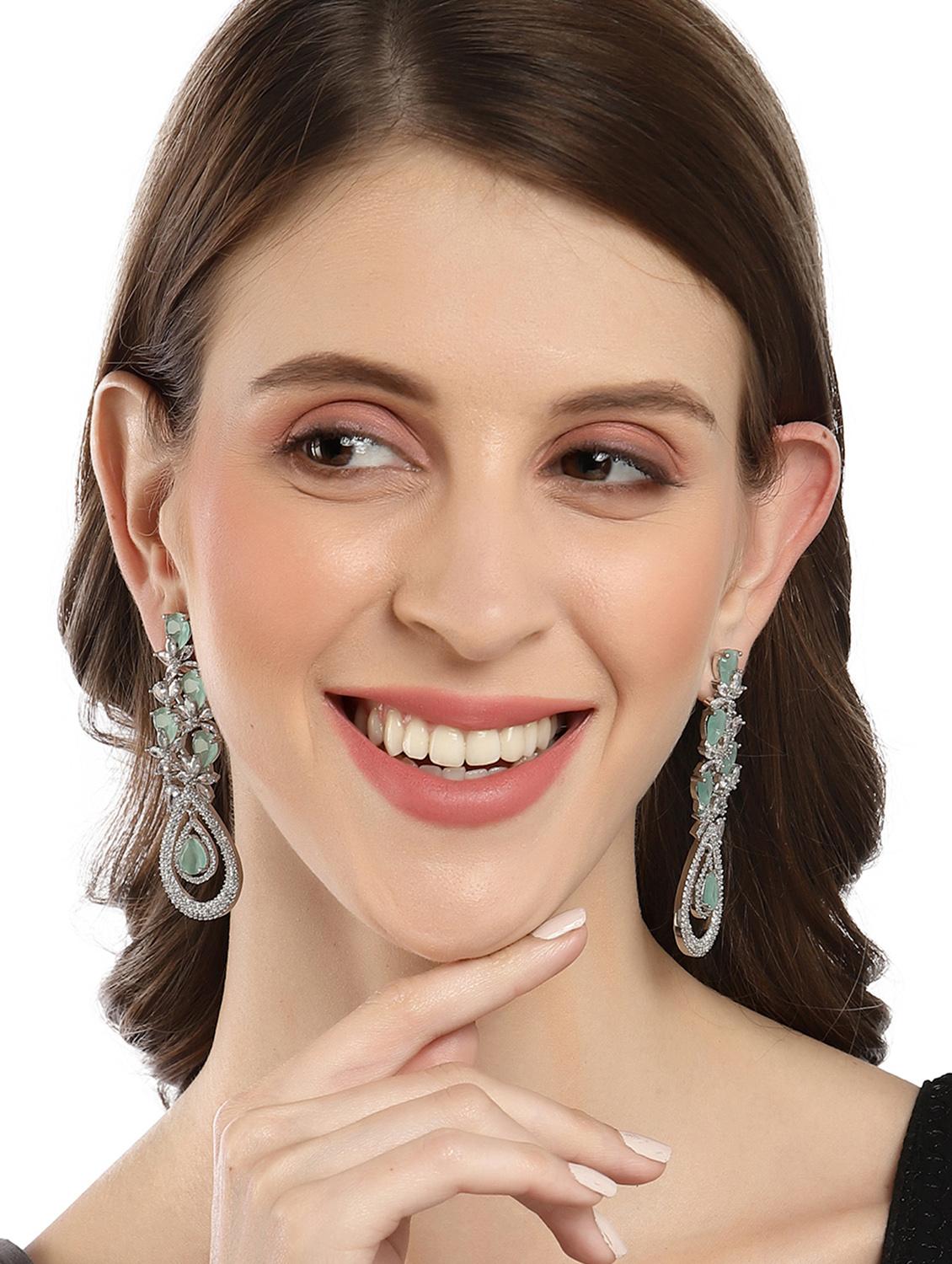green metal earring - 18633214 - Standard Image - 4