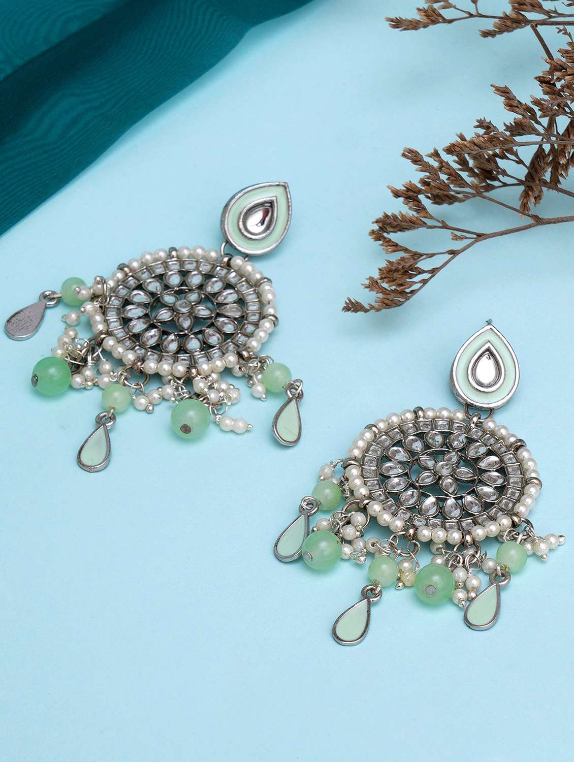 green metal earring
