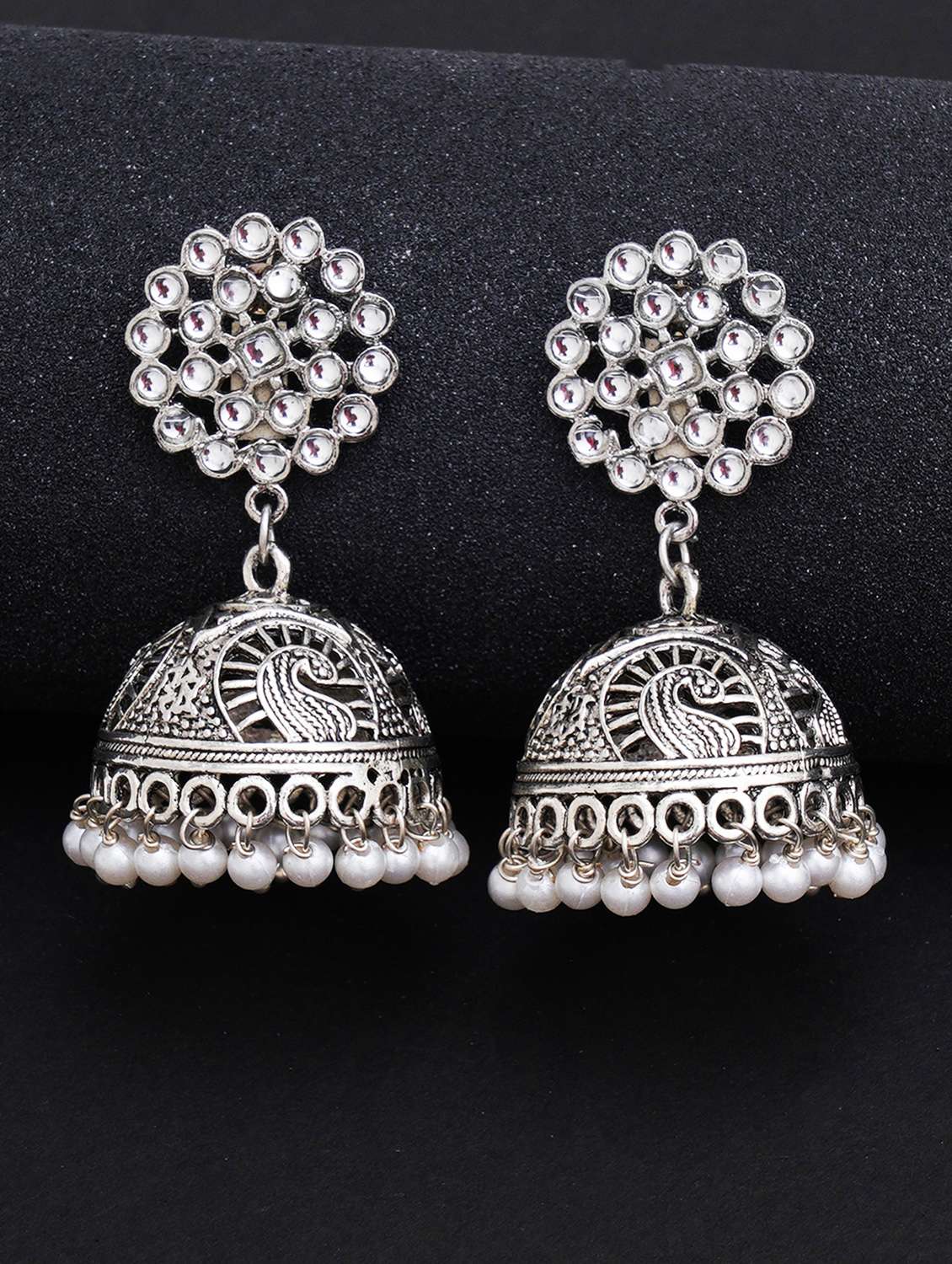 white metal earring