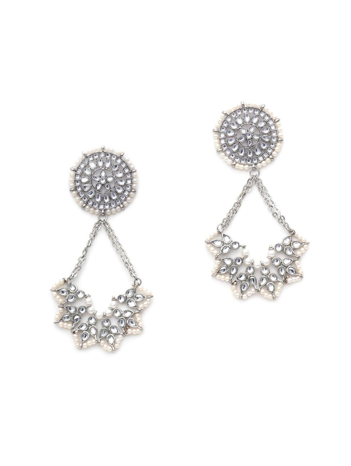 silver metal earring - 18633432 - Standard Image - 1