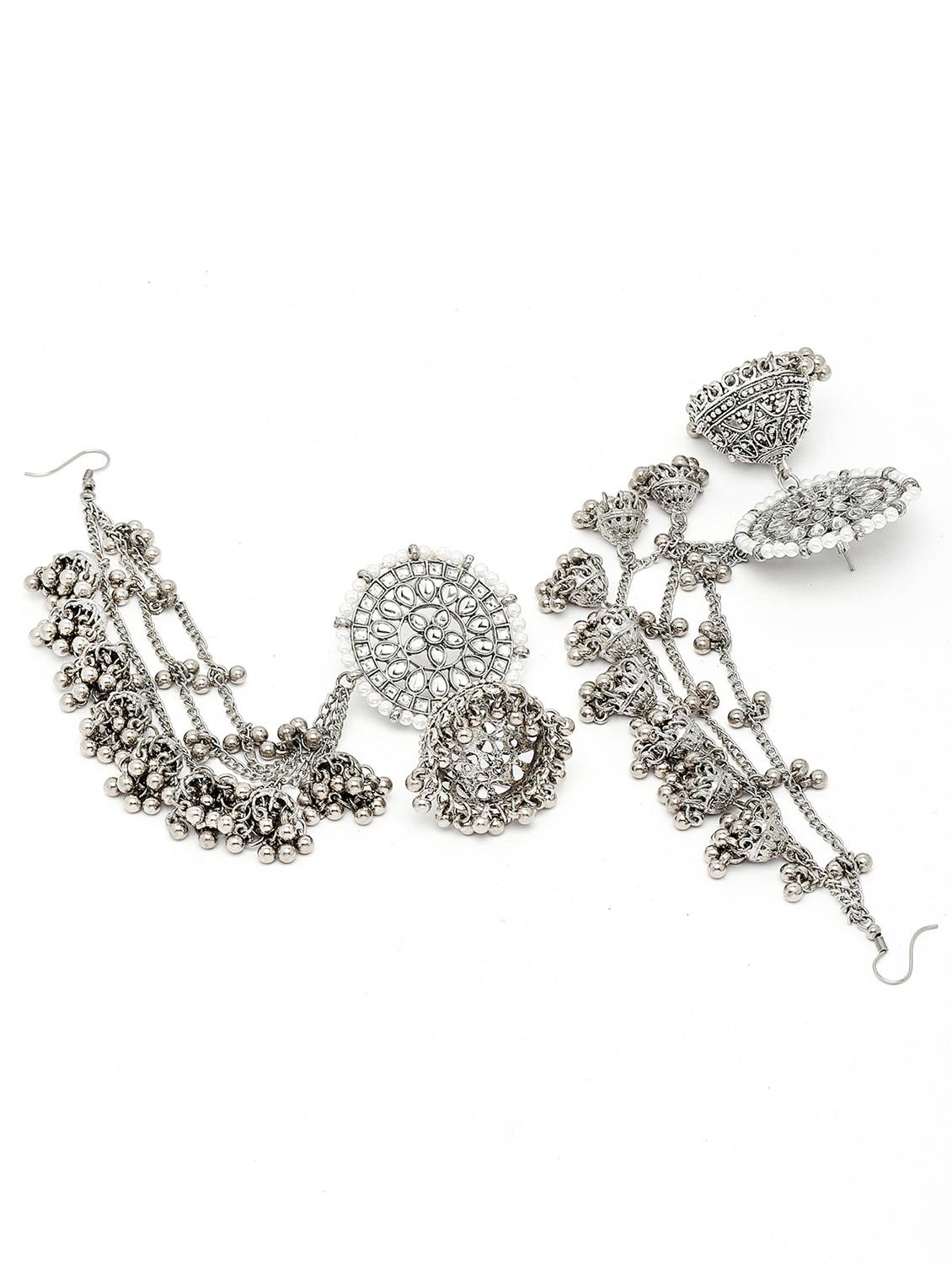 silver metal earring - 18633441 -  Standard Image - 1