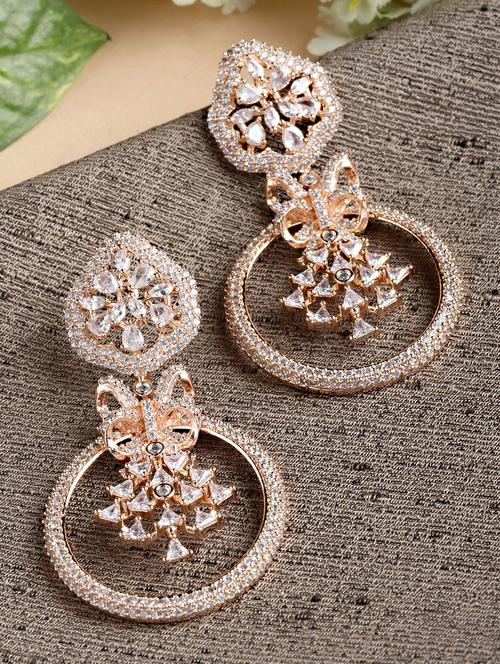 gold metal earring - 18633447 -  Standard Image - 0