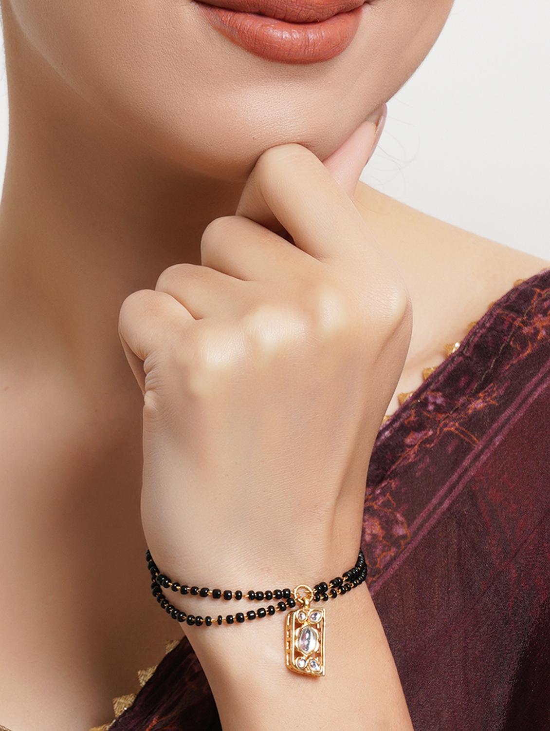 gold metal bangle bracelet - 18635721 - Standard Image - 4