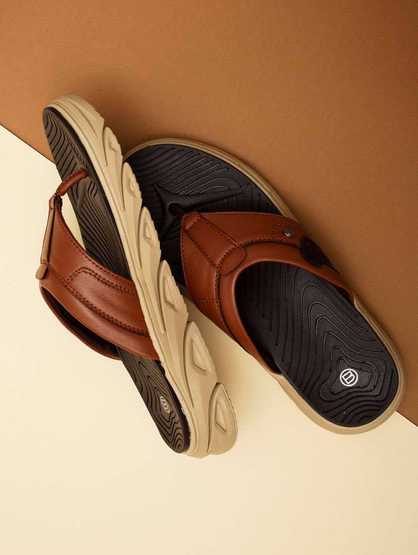 tan synthetic & mesh slip on slippers