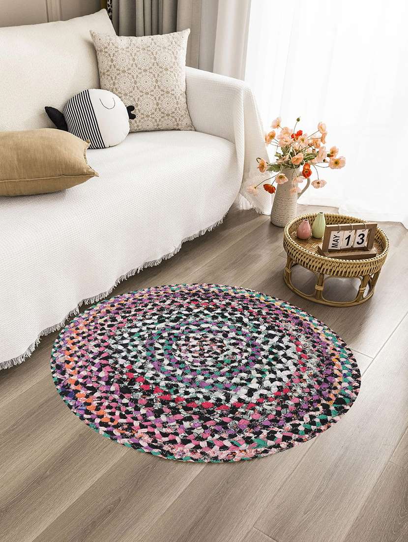 young colored round shape cotton rug