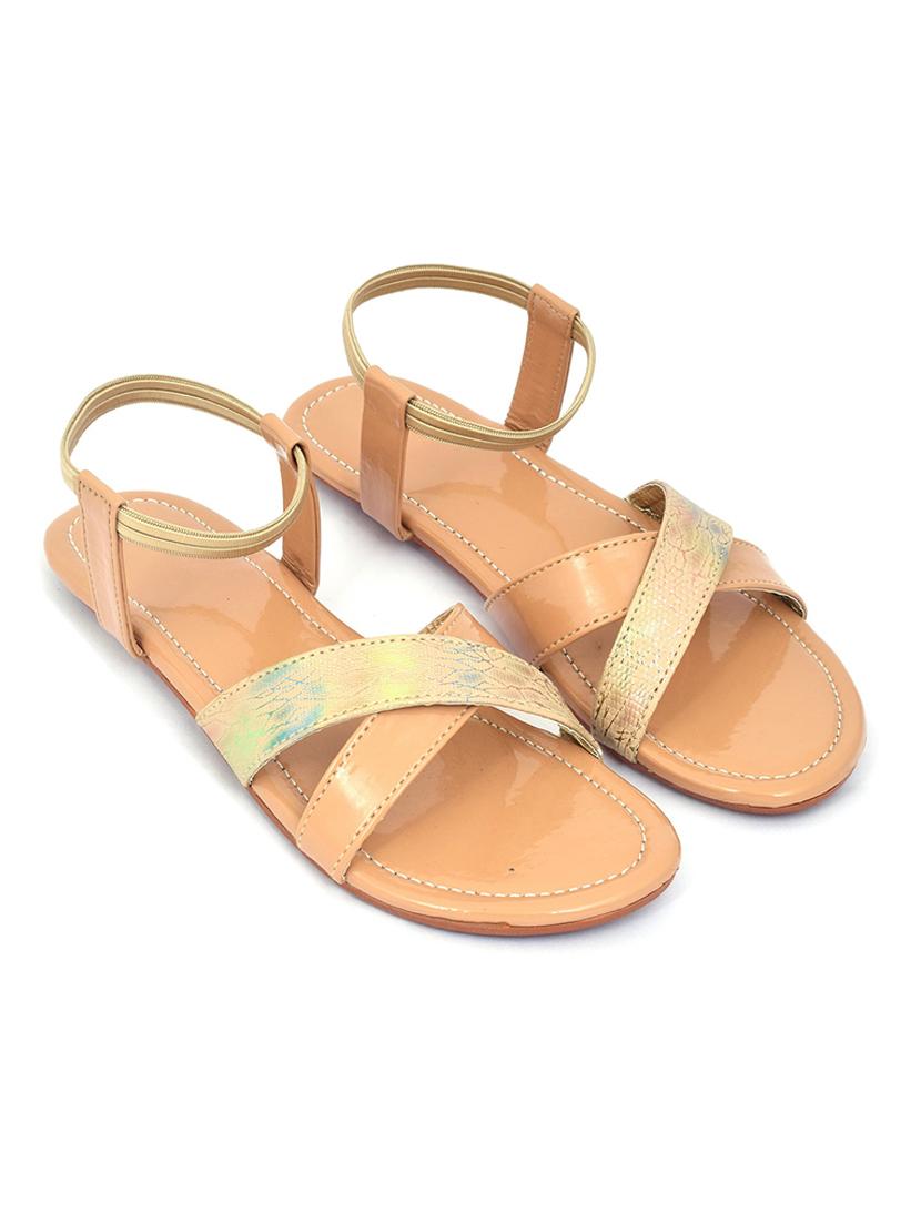 beige colored slip on flat sandal