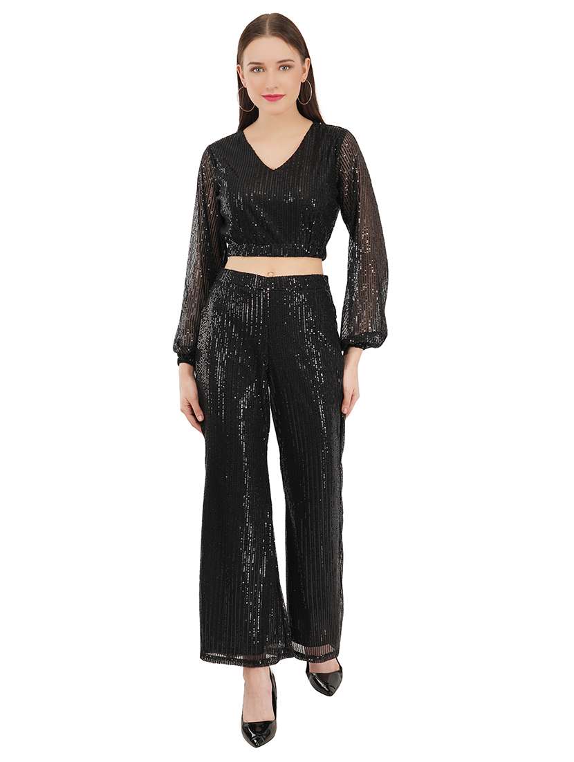 black sequin top and trouser set