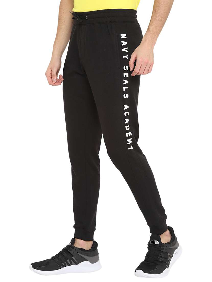 men black placement print mid rise jogger - 19223837 -  Standard Image - 1