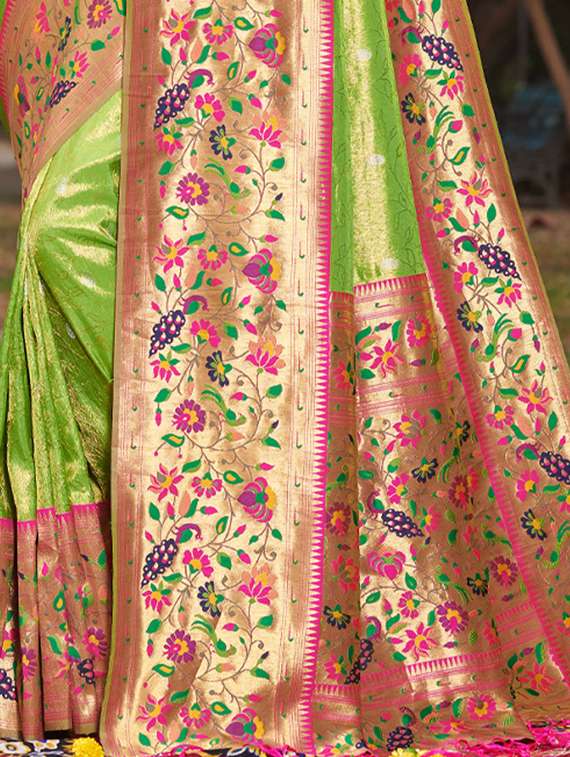 Women's Self Design Green Colored Saree With Blouse